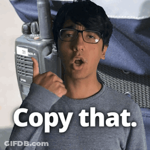 Man In Glasses Talking On Walkie Talkie Saying Copy That GIF