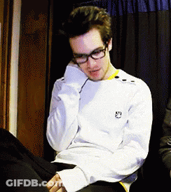 Man In Glasses With Smiley Sweater GIF