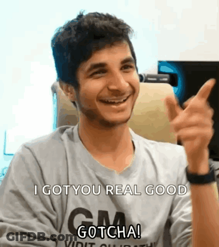Man In GM Gotcha T-Shirt Smiling And Thumbs Up GIF