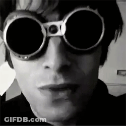 Man In Goggles Making Face Black And White GIF