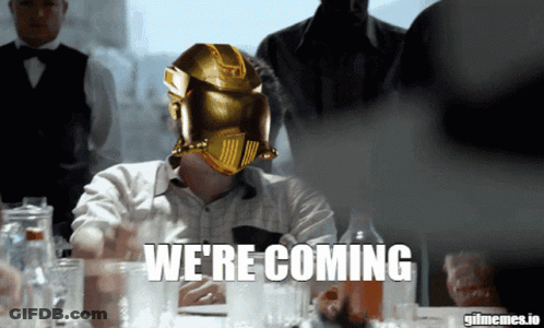 Man In Gold Helmet Saying We're Coming GIF
