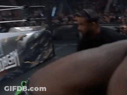 Man In Gold Jacket In Wrestling Ring GIF