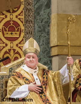 Man In Gold Robe Holding Cane Beside Crown GIF