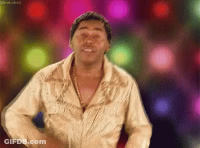 Man In Gold Shirt Dancing Silent Cakes GIF