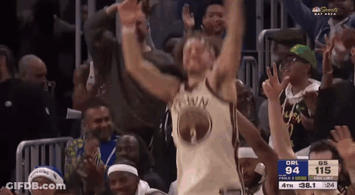 Man In Golden State Warriors Jersey Jumping During Basketball Game GIF