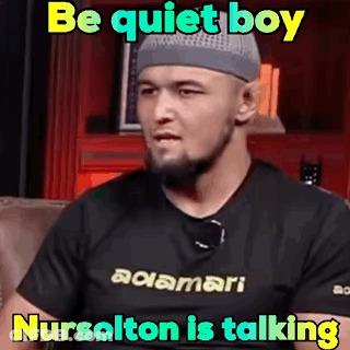 Man In Gray Hat And Black Shirt Be Quiet Boy Nursolton Is Talking GIF