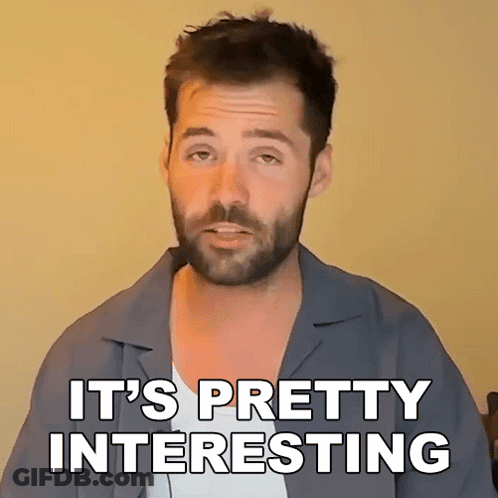 Man In Gray Shirt And Glasses Says This Is Interesting GIF
