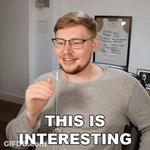 Man In Gray Shirt And Glasses Says This Is Interesting GIF