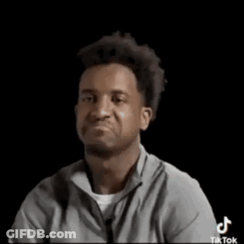 Man In Gray Shirt Making Funny Face GIF