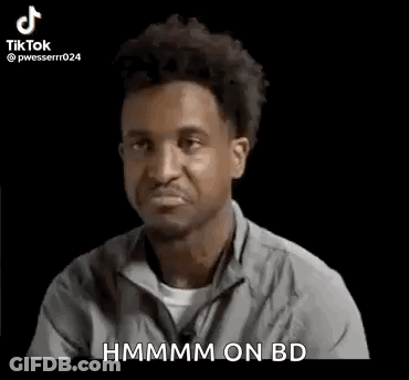 Man In Gray Shirt Making Funny Face Saying Hmm On BD GIF