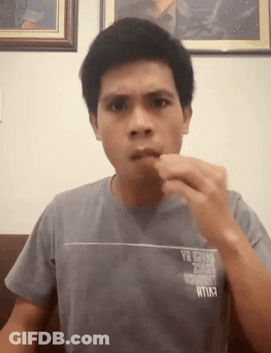 Man In Gray Shirt Saying Exile GIF