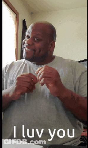 Man In Gray Shirt Saying I Love You GIF