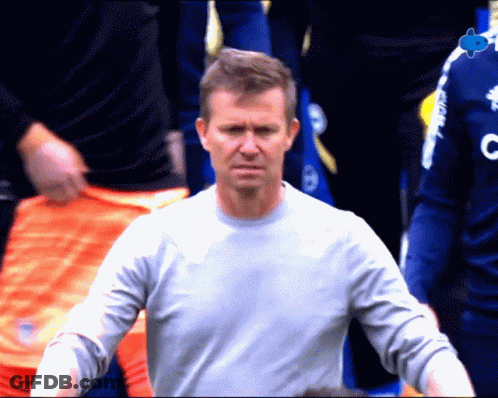Man In Gray Shirt With Letter C GIF
