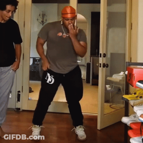 Man In Gray Shirt With Letter N GIF