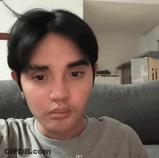 Man In Gray Zky Shirt On Couch GIF