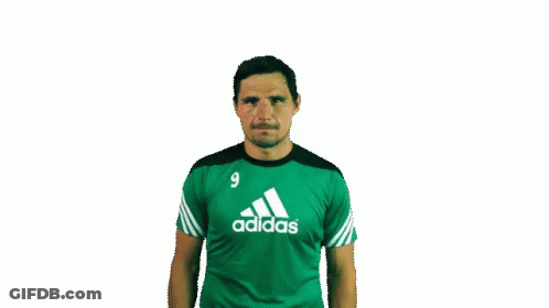 Man In Green Adidas Shirt Thumbs Down GIF