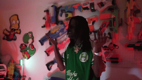 Man In Green Alaska Shirt By Nerf Guns GIF