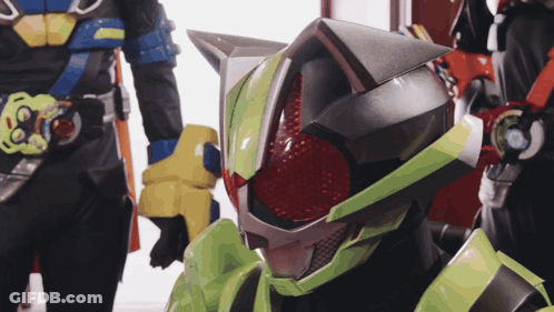 Man In Green And Black Helmet With Red Eye GIF