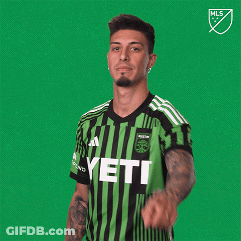 Man In Green And Black Striped Jersey Saying Yeti GIF