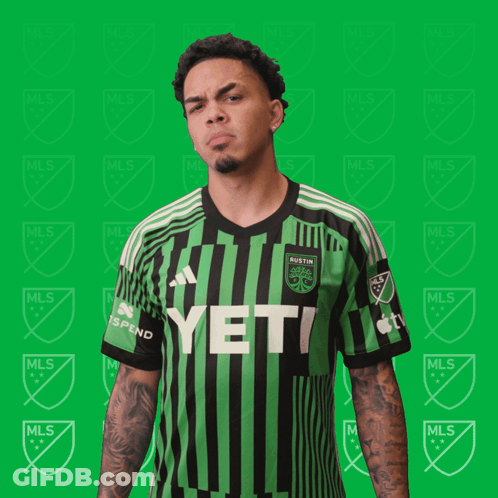 Man In Green And Black Striped Yeti Jersey GIF