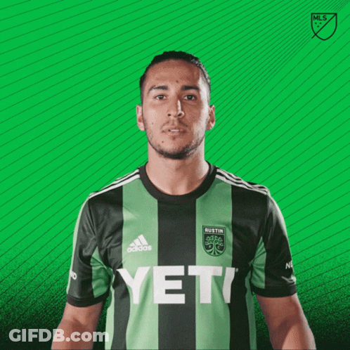 Man In Green And Black Yeti Jersey GIF