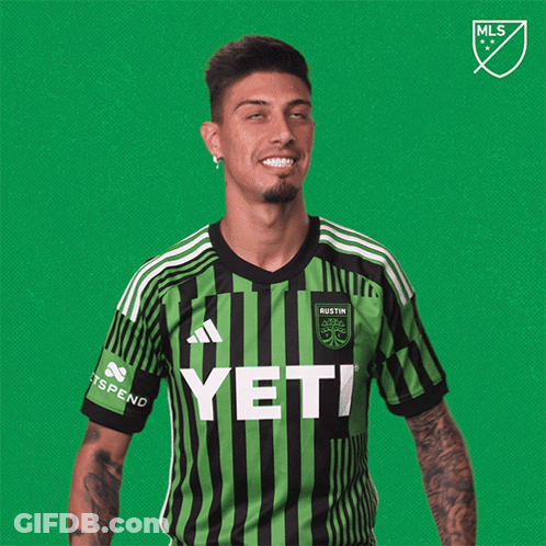 Man In Green And Black Yeti Jersey GIF