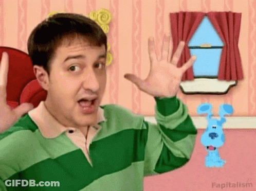 Man In Green And Pink Striped Shirt Waving At Blue Dog GIF