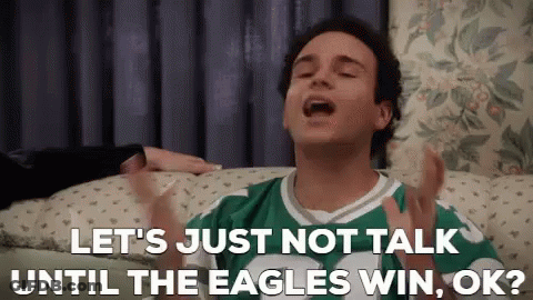 Man In Green And White Jersey Talking GIF