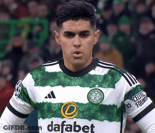 Man In Green And White Jersey With Dafabet GIF