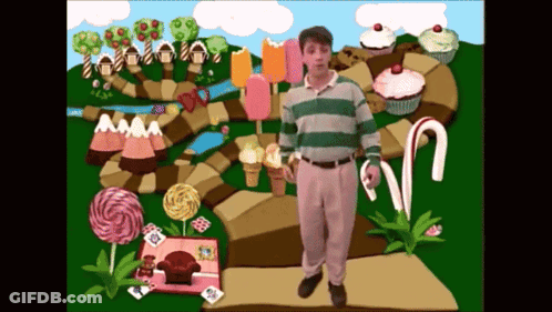 Man In Green And White Striped Shirt In Candy Land GIF