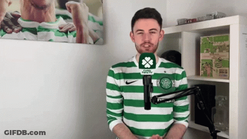 Man In Green And White Striped Shirt Talking GIF