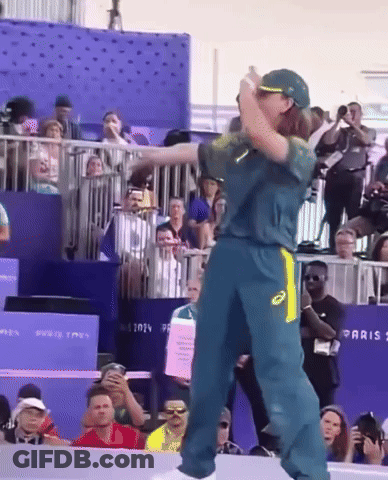 Man In Green And Yellow Asics Jersey Dancing GIF