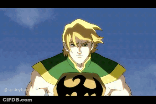 Man In Green And Yellow Holding Skull GIF