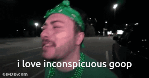 Man In Green Bandana And Beads Says I Love Inconspicuous Goop GIF