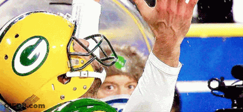 Man In Green Bay Packers Helmet Waving GIF