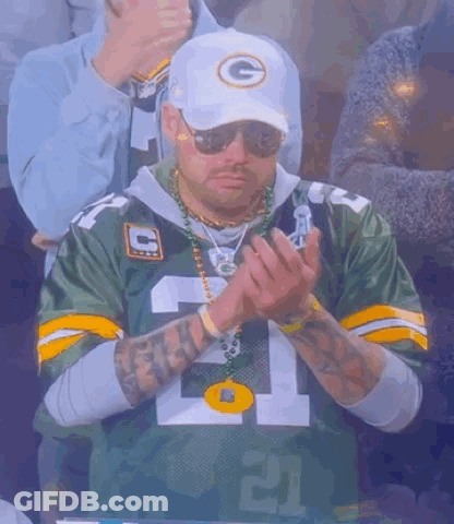 Man In Green Bay Packers Jersey And White Hat Clapping GIF