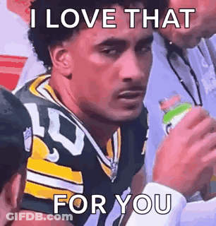 Man In Green Bay Packers Jersey Holding Soda GIF