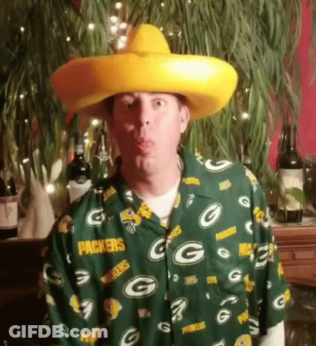 Man In Green Bay Packers Shirt Blowing A Kiss GIF