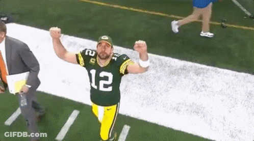 Man In Green Bay Packers Uniform Running On Football Field GIF