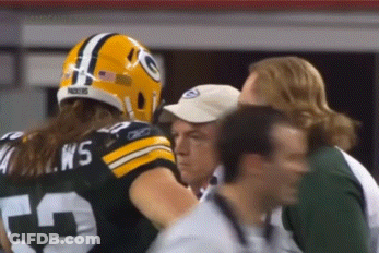 Man In Green Bay Packers Uniform Talking To Another Man GIF