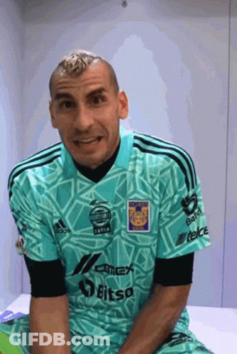 Man In Green Bitsa Shirt GIF