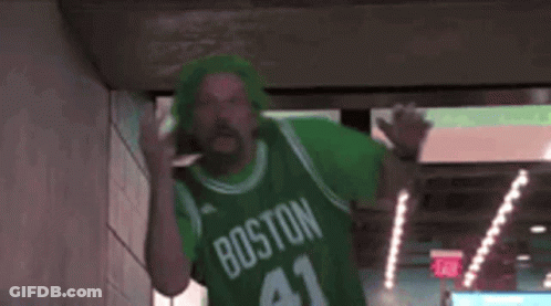Man In Green Boston 41 Jersey Walking Through Hallway GIF