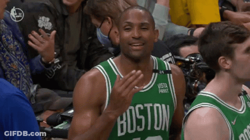 Man In Green Boston Jersey Applauding During Game GIF