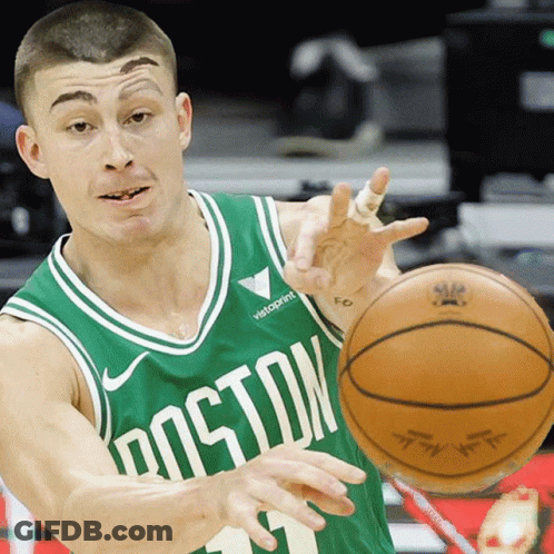 Man In Green Boston Jersey Holding Basketball GIF