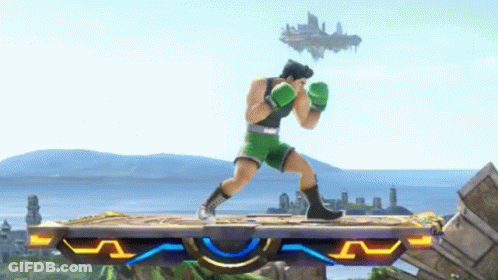Man In Green Boxing Gloves On Platform GIF