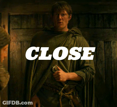 Man In Green Cape Holding Sword GIF