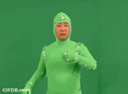 Man In Green Costume GIF