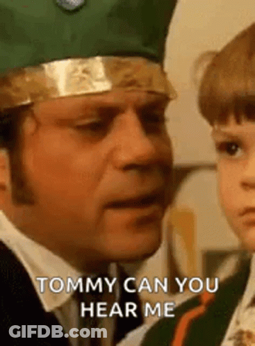 Man In Green Crown Talking To Child GIF