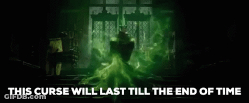 Man In Green Dress Surrounded By Green Smoke GIF