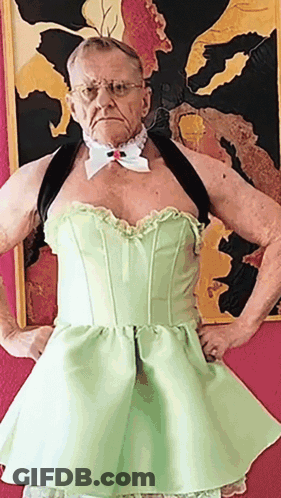 Man In Green Dress With Bow Tie GIF